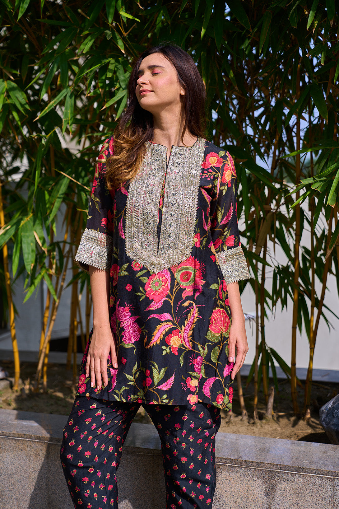 Black digitally printed kurta with silver lace yoke & black printed pants.