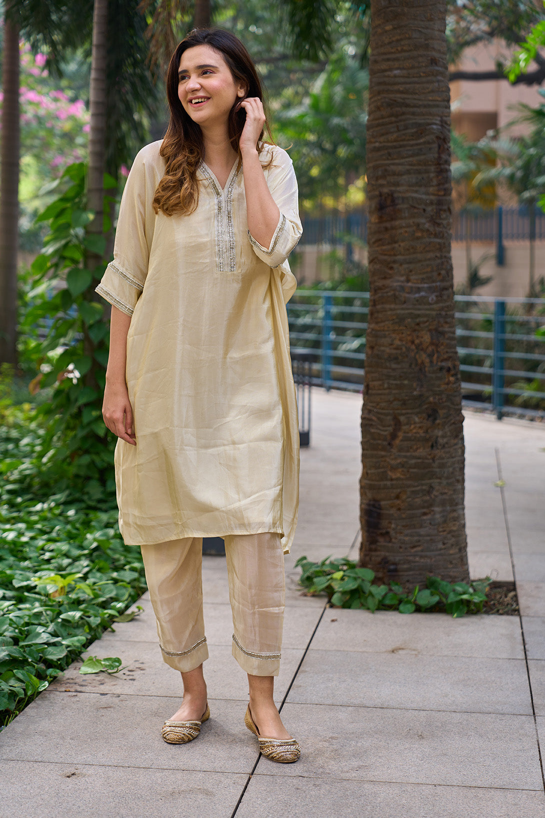 Gold tissue soft silk kurta & pants set with diamante detailing.