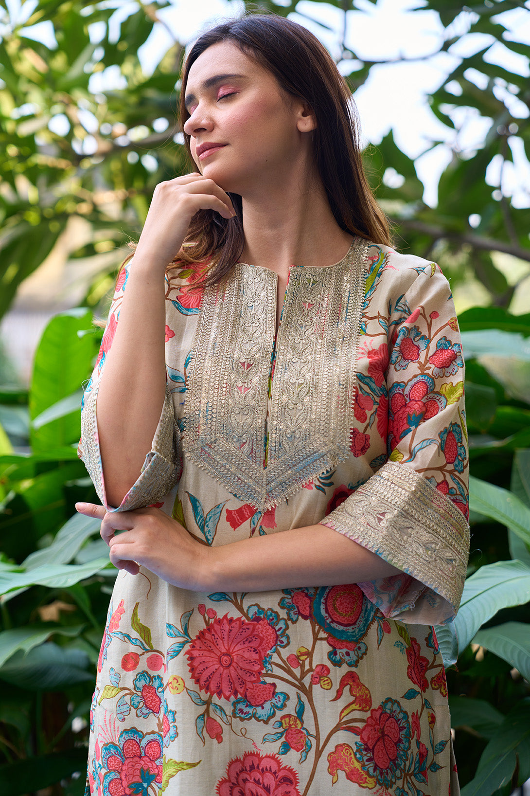 Pista colour digitally printed floral design kurta with silver lace yoke & digitally printed pants.