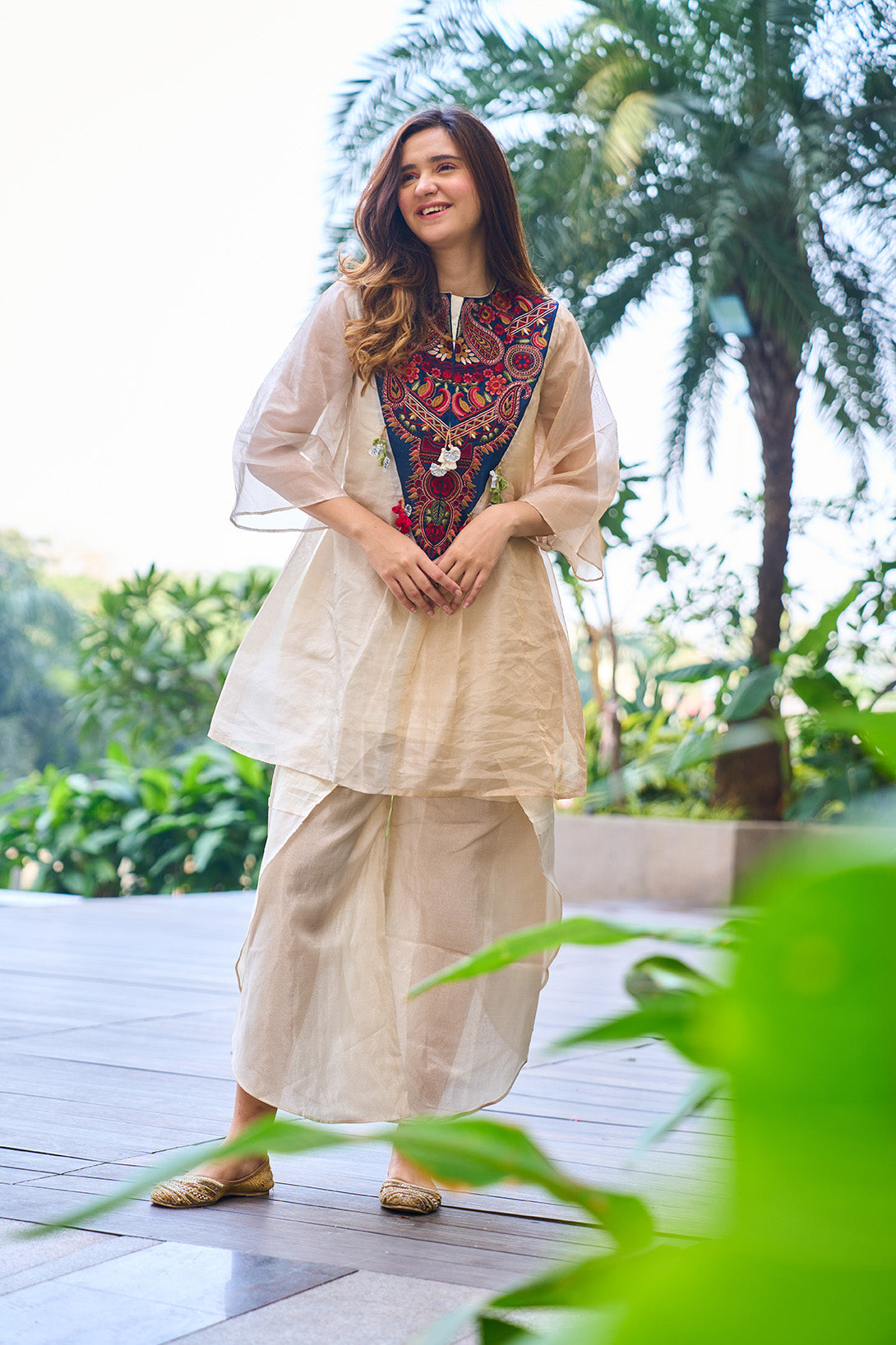 Gold -silver pure organic tissue kurta with embroidered yoke and organic tissue flared dhoti pants.