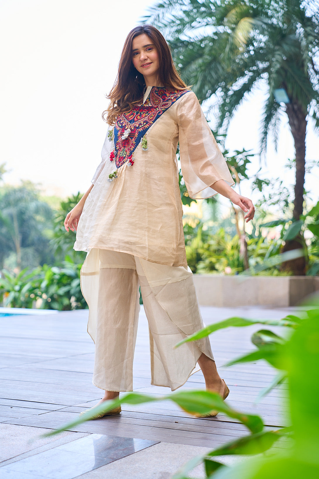 Gold -silver pure organic tissue kurta with embroidered yoke and organic tissue flared dhoti pants.