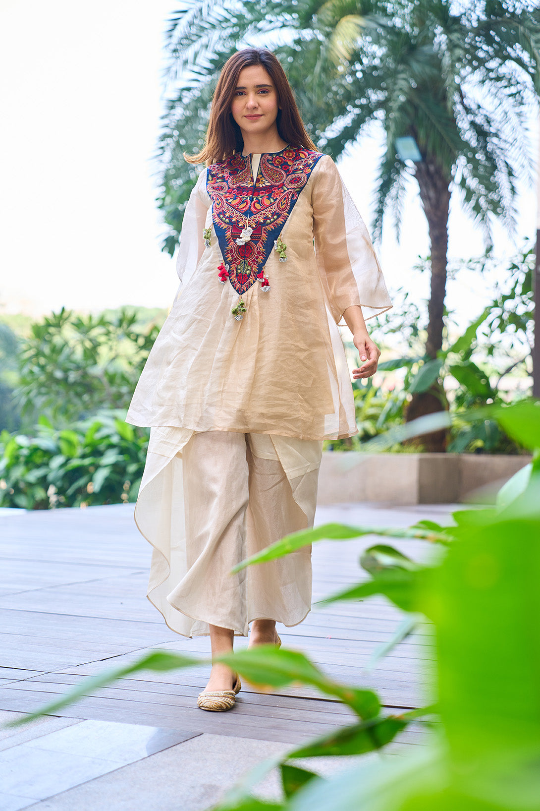 Gold -silver pure organic tissue kurta with embroidered yoke and organic tissue flared dhoti pants.