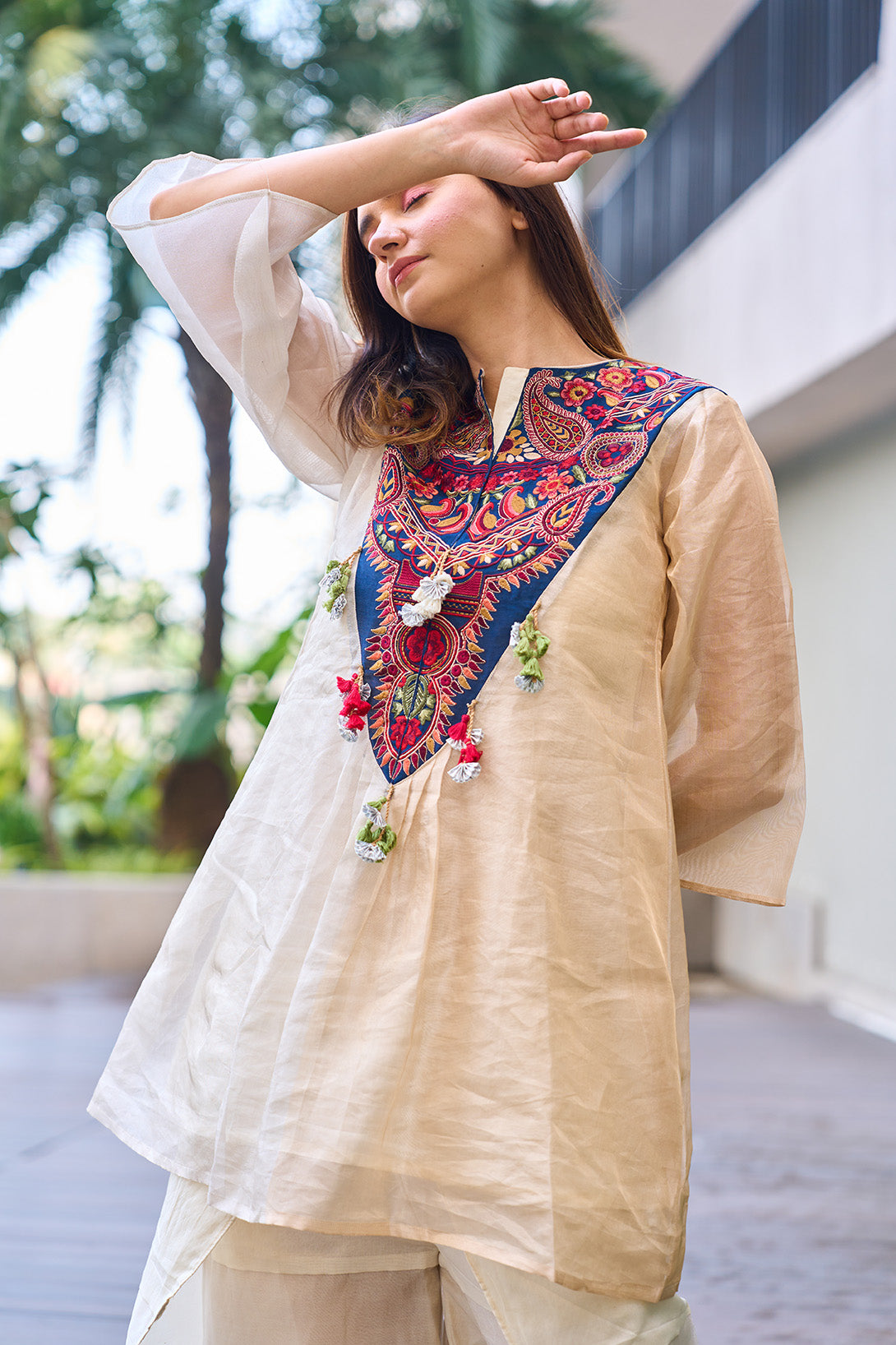 Gold -silver pure organic tissue kurta with embroidered yoke and organic tissue flared dhoti pants.