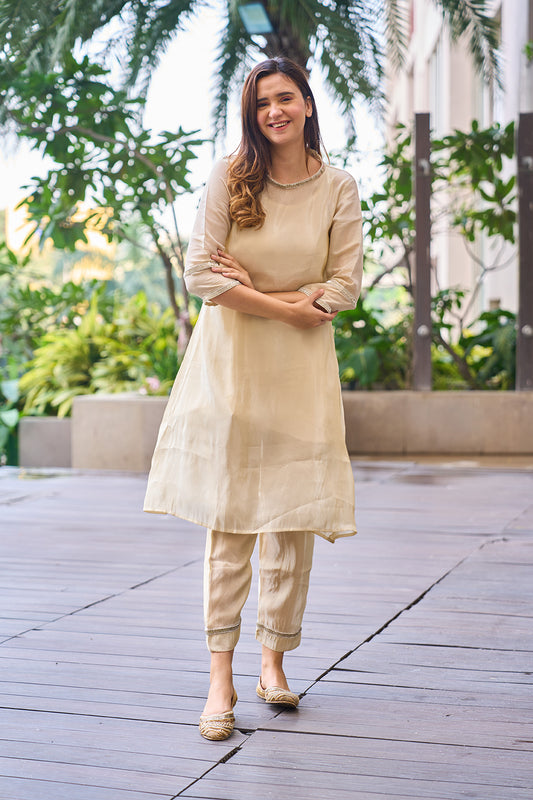 Gold tissue soft silk set with diamante detailing.