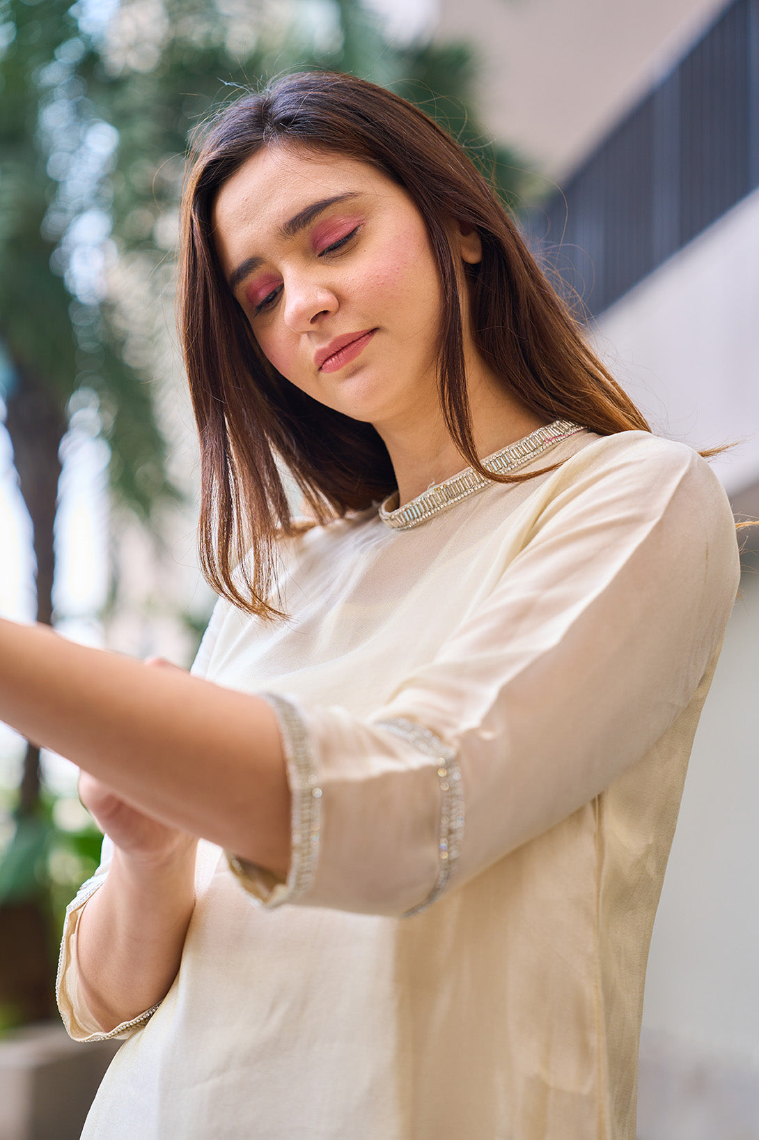 Gold tissue soft silk set with diamante detailing.