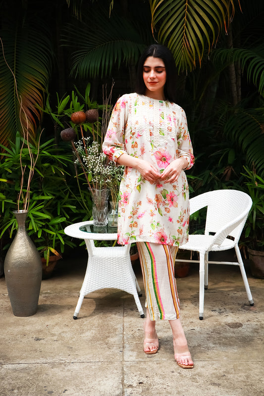 Off white floral muslin tunic with striped muslin pants set.