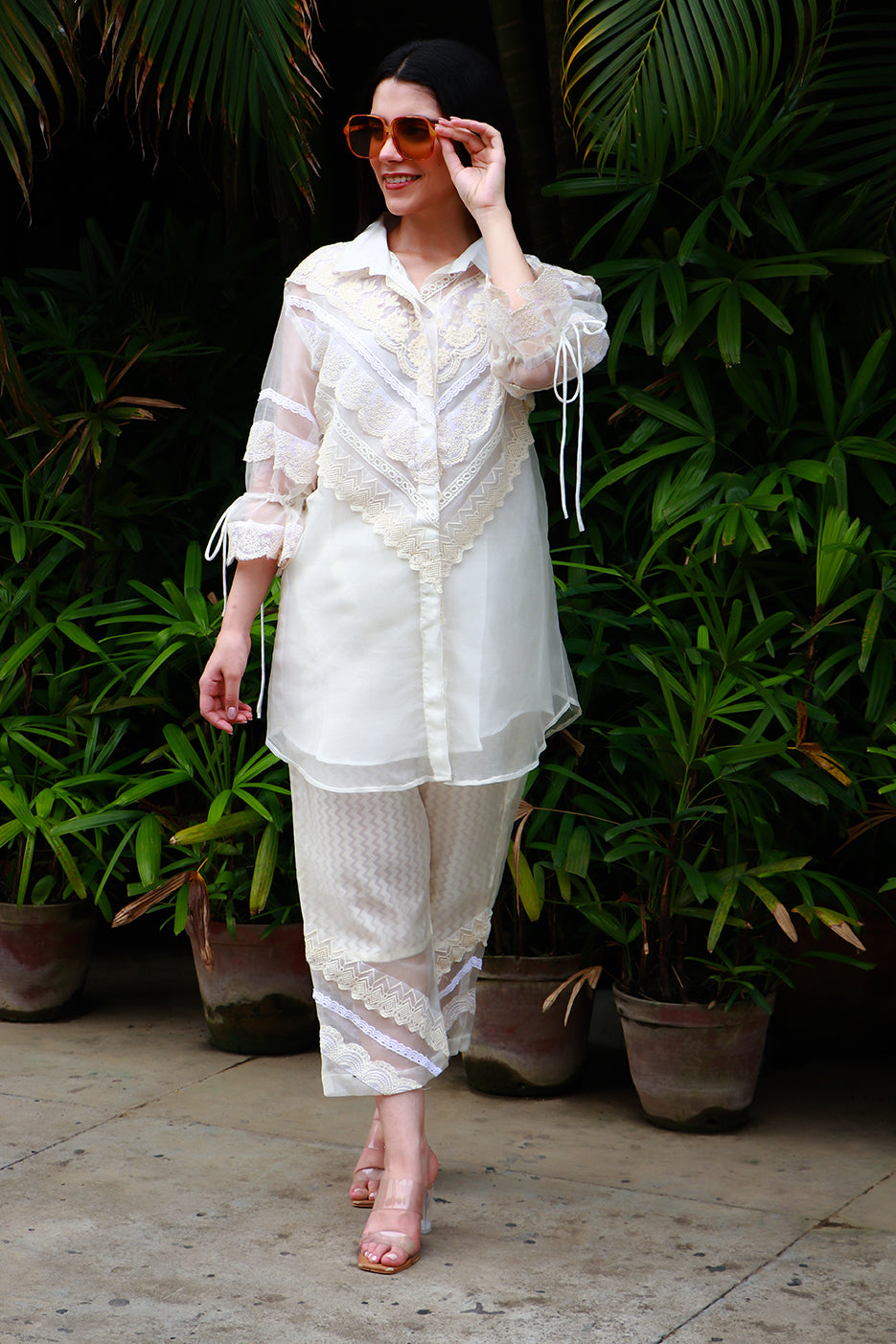 Off white organza & lace tunic with chanderi & lace pants.