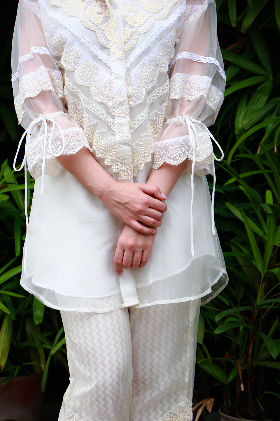 Off white organza & lace tunic with chanderi & lace pants.