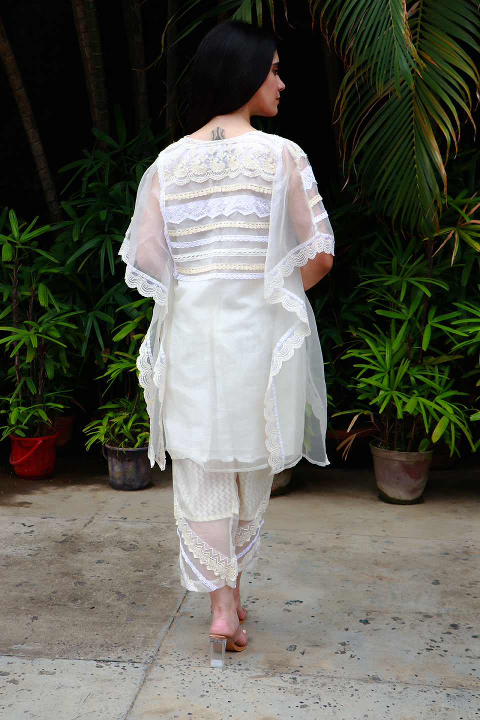 Off white organza kaftan tunic with lace & chanderi pants.