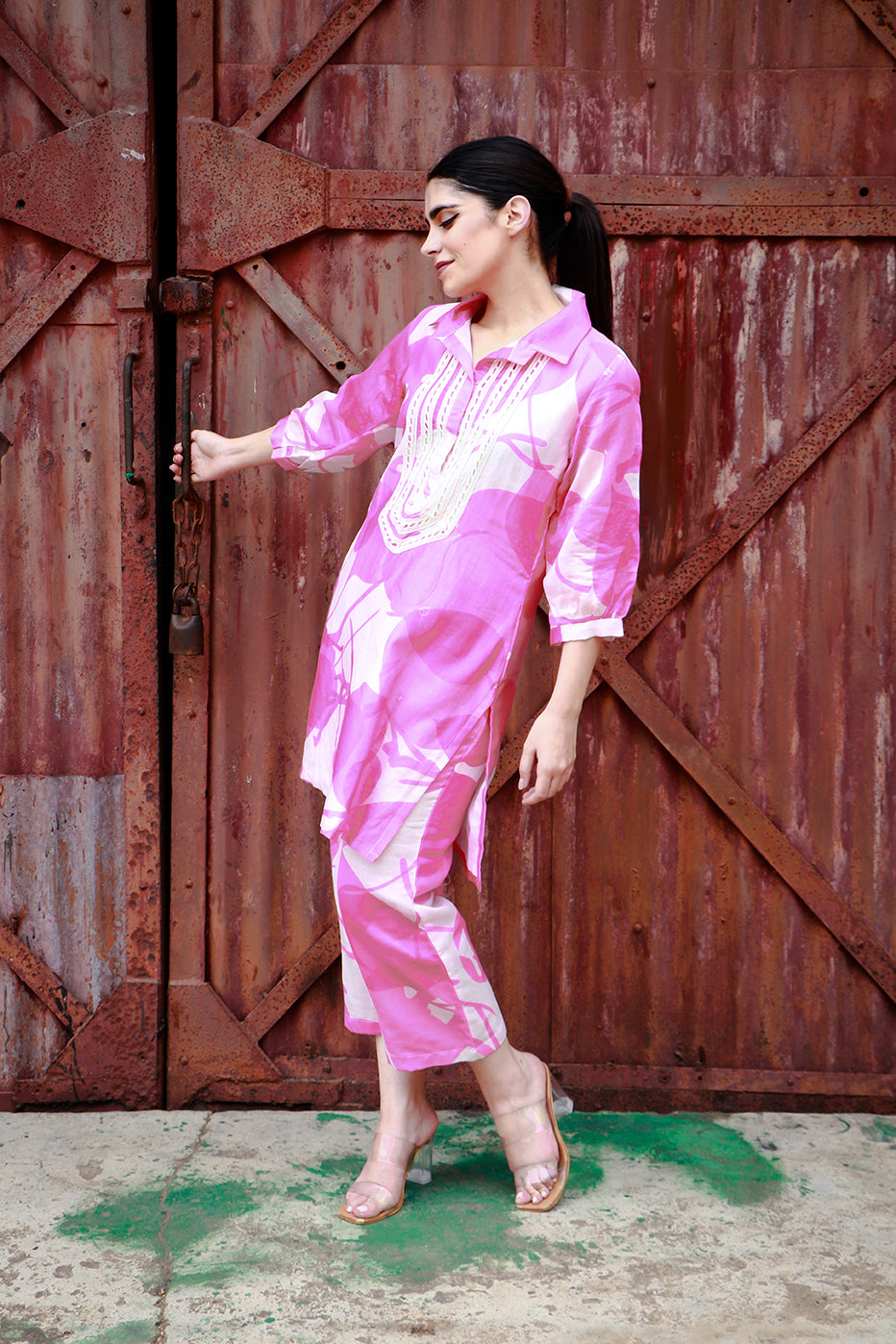 Pink abstract print tunic and pant set.