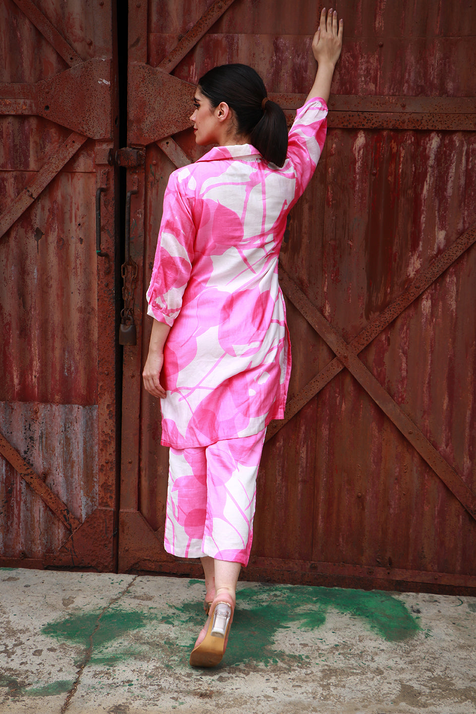 Pink abstract print tunic and pant set.