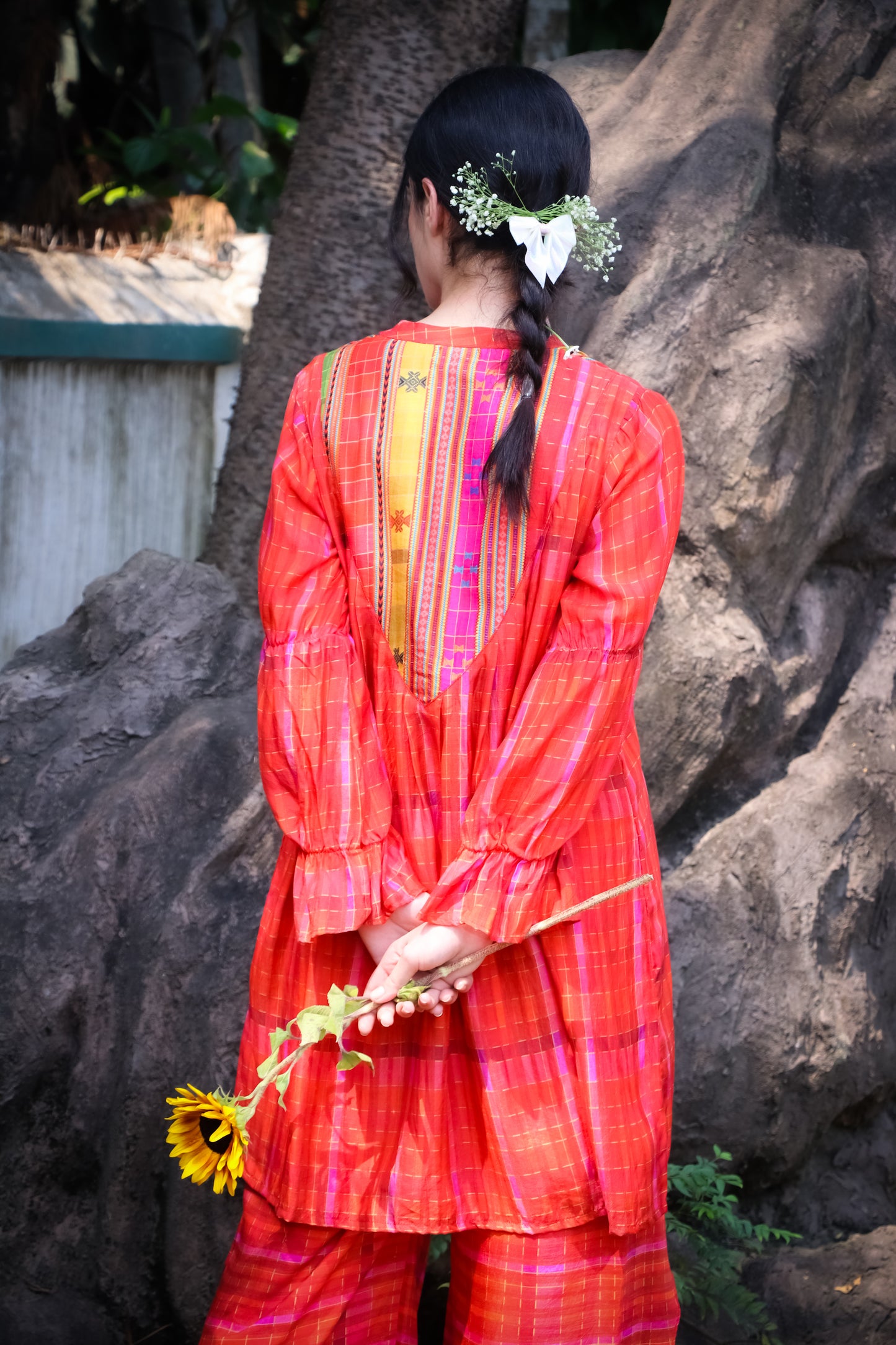 Orange madras self checks muslin kurti with printed yoke and dhoti pants