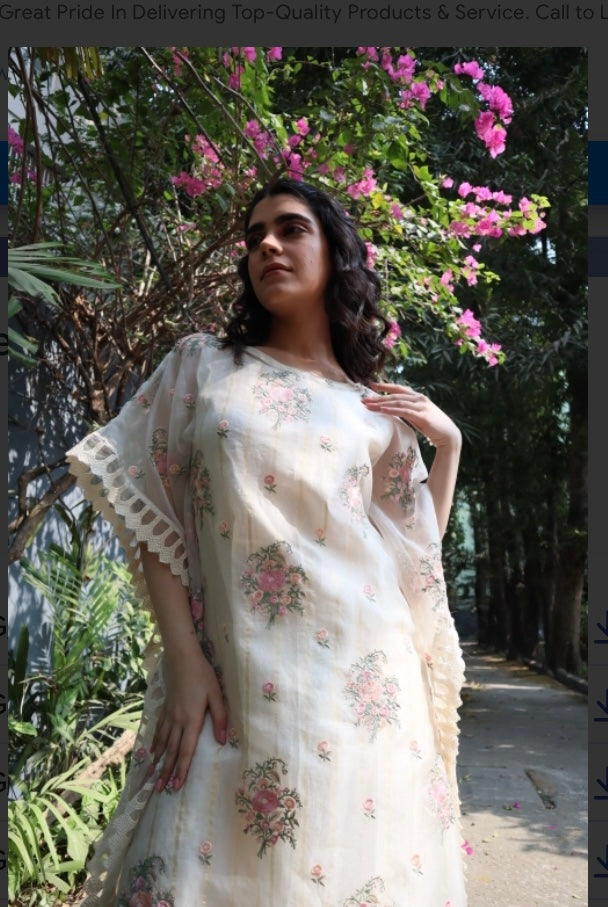 Off white Organza kaftan style tunic with embroidered floral motifs / chanderi gold weave inner and pants